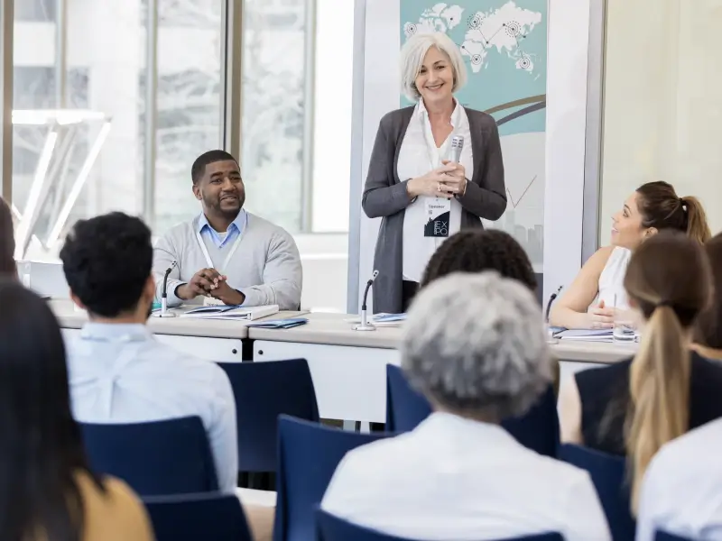 Group interacting with professors